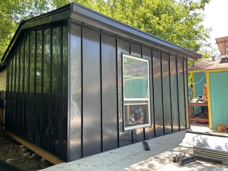 Black standing seam metal wall panels for Roof Inspection in Beckett Ridge