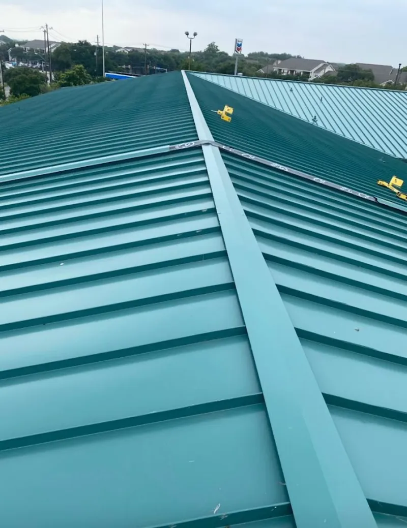 Green commercial metal roof ridge and valley for Metal Roof Repair in Beckett Ridge