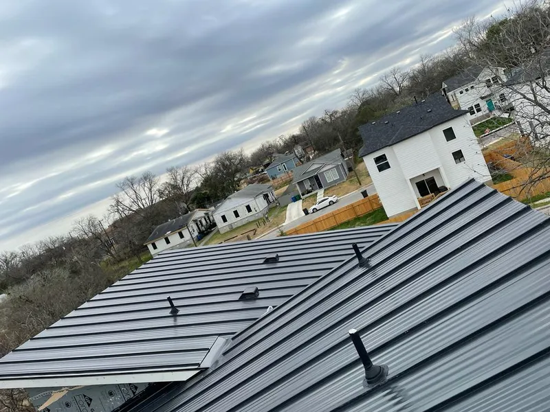 Standing seam metal roof panels with vents for Skylight Repair in Beckett Ridge